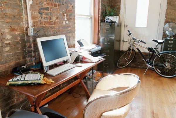 computer in office in Phoenix, sharing success tips for listing real estate investments